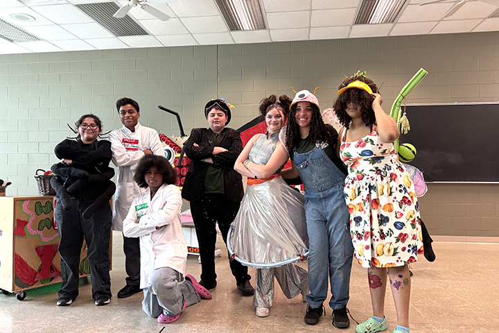 Students pose in costumes